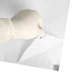 Integrity Adhesive Mat - White Color - Gloved hand peeling back mat to reveal second layer